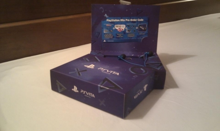 Фотография упаковки, предзаказанной PS Vita